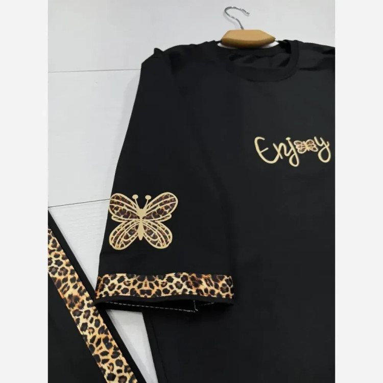 ست تیشرت و شلوار زنانه مدل enjoy جنس اسپان گلکسی رنگ مشکی فری سایز 38 تا 46