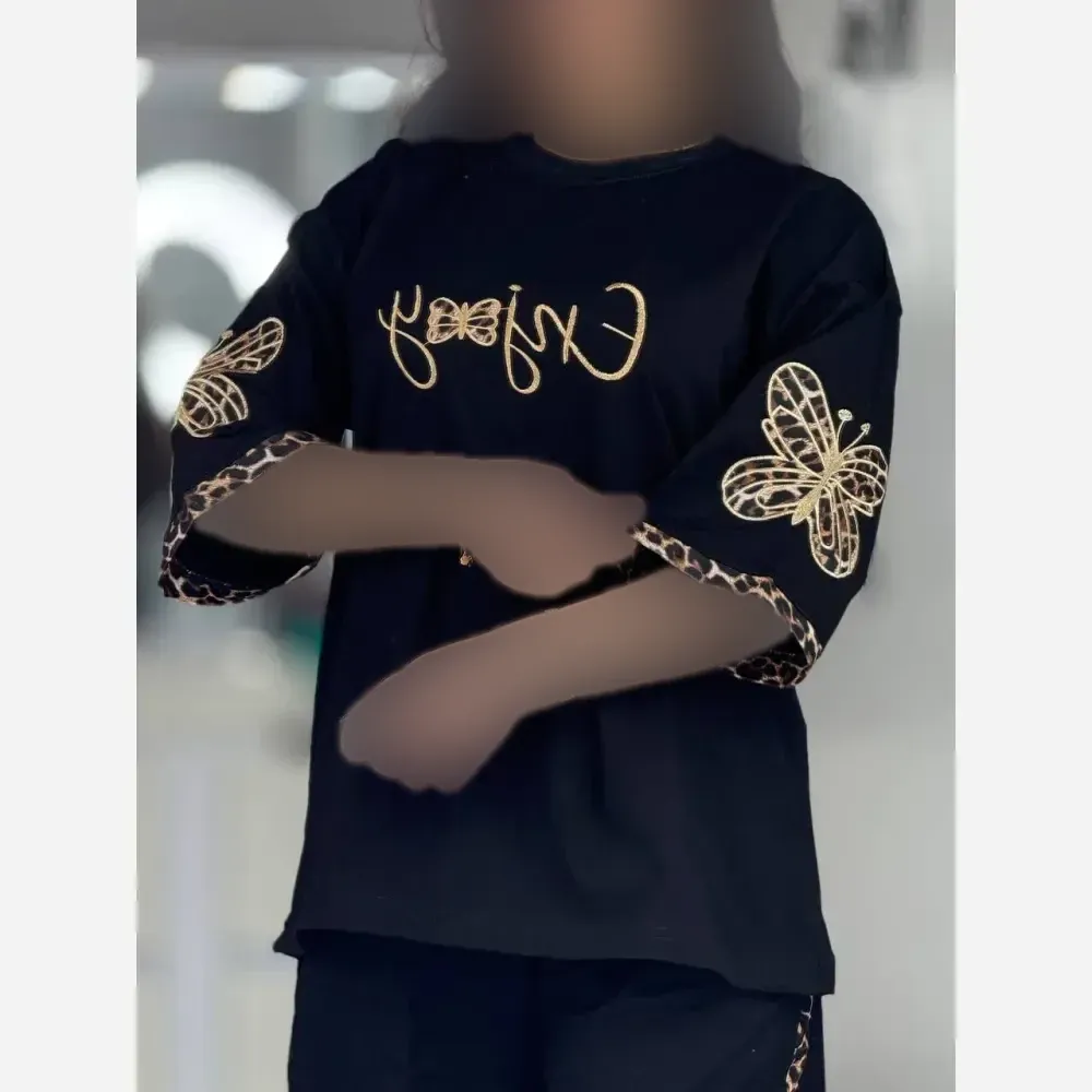 ست تیشرت و شلوار زنانه جنس پنبه گلکسی رنگ مشکی فری سایز گیلدا