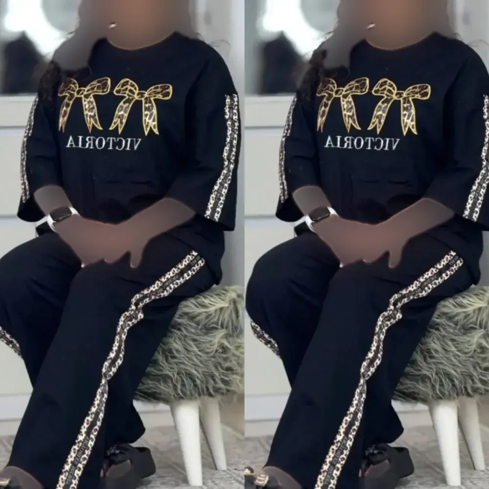 ست تیشرت و شلوار زنانه جنس پنبه گلکسی رنگ مشکی فری سایز آرتینا