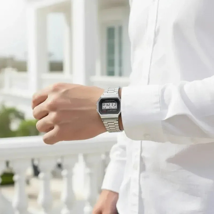 ساعت مچی دیجیتال مردانه کاسیو بند استیل نقره ای صفحه مشکی مدل AWS