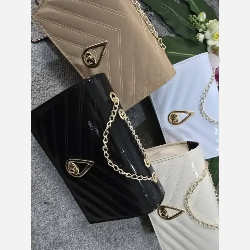کیف زنانه چرم ورنی مشکی سایز آزاد